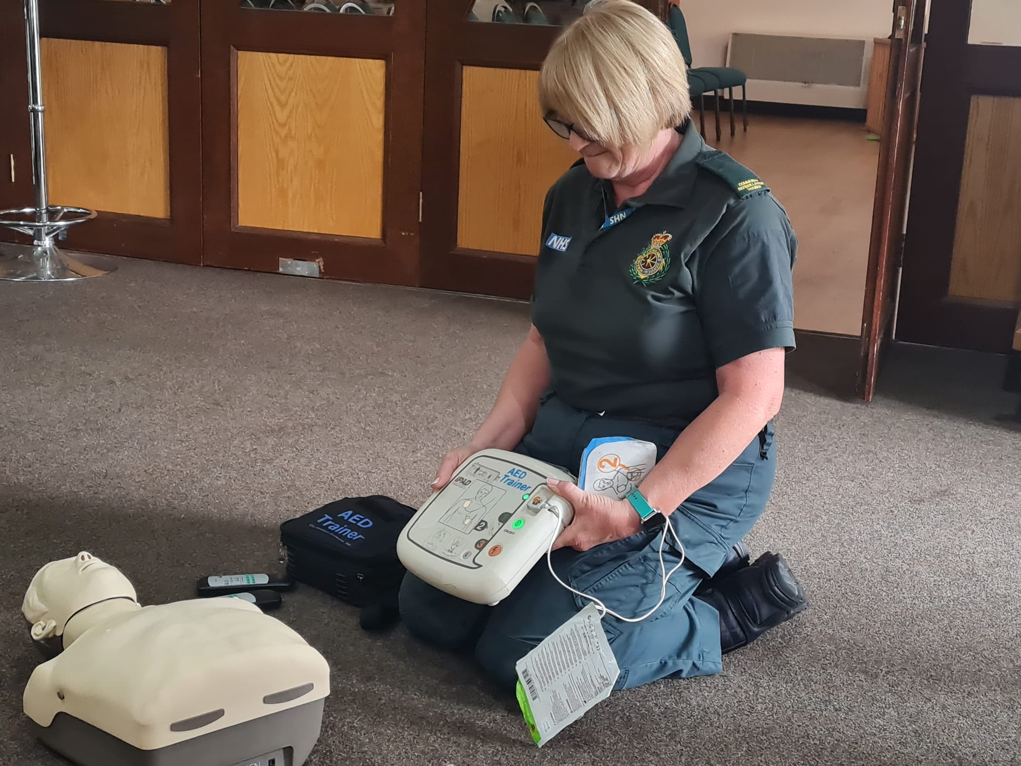 Demonstration of using a defibrillator