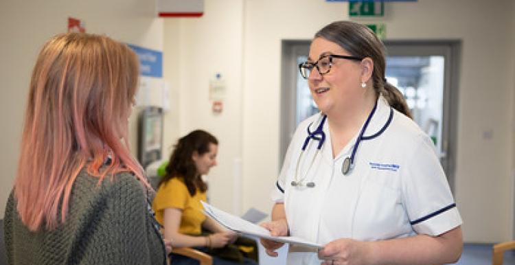 Nurse talking to a patient