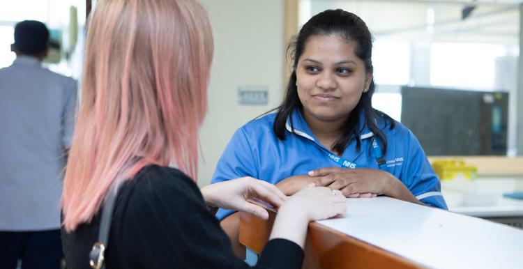 Person talking to a nurse
