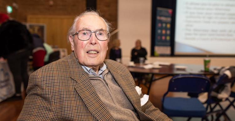 Older gentleman in a tweed jacket