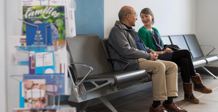 two people in a hospital waiting room