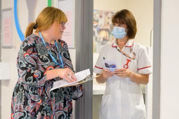 Nurse talking to a healthwatch lady