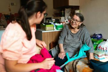 Caregiver assisting someone in their home